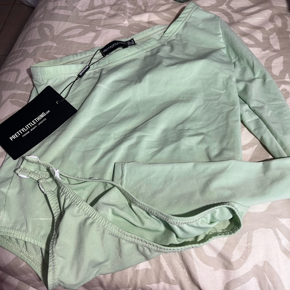 one sleeve bodysuit